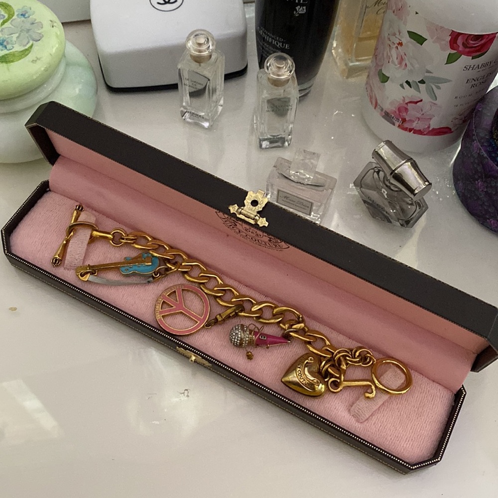Juicy couture bracelet with 3 charms with box